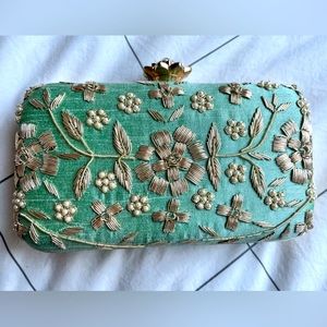 Sea foam green clutch, the silver, gold and pearl detailing.